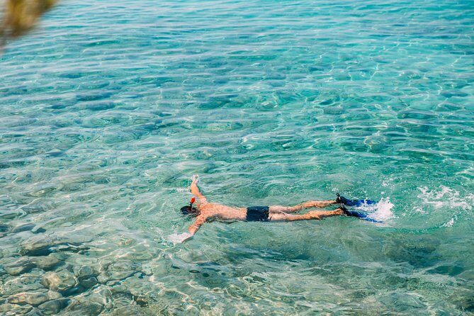 Amed Bali Snorkelling: Japanese Shipwreck & Vienna Beach Tour - Stop 1: Lipah Beach and the boat ride toward Amed Wreck