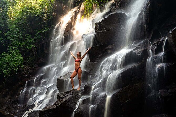 Best of Ubud: Waterfalls, Temple & Rice Terraces Private Day Tour - Kanto Lampo Waterfall: photos, rock formations, and that first rush