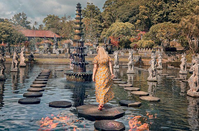 Discover East Bali: Snorkeling Blue lagoon & Instagramable Spots - Tirta Gangga Water Palace: fountains, statues, and pool reflections