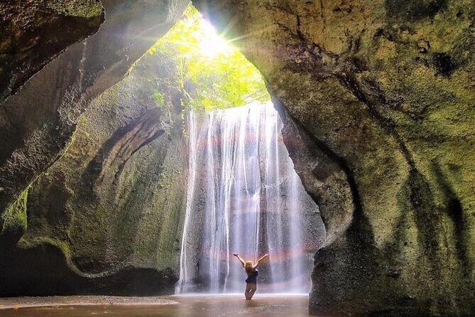 Discover the best waterfalls in Ubud and rice terraces tour - Kanto Lampo Waterfall: tumbling cascades and the river right under you