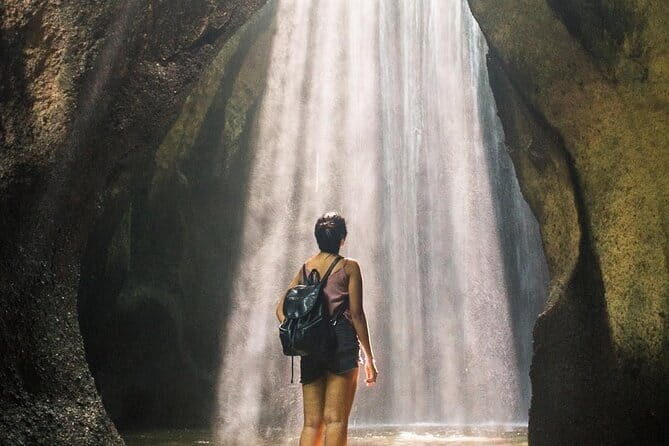 Eastern Bali and Besakih Temple Tour - Tukad Cepung waterfall: a cave waterfall where timing really matters
