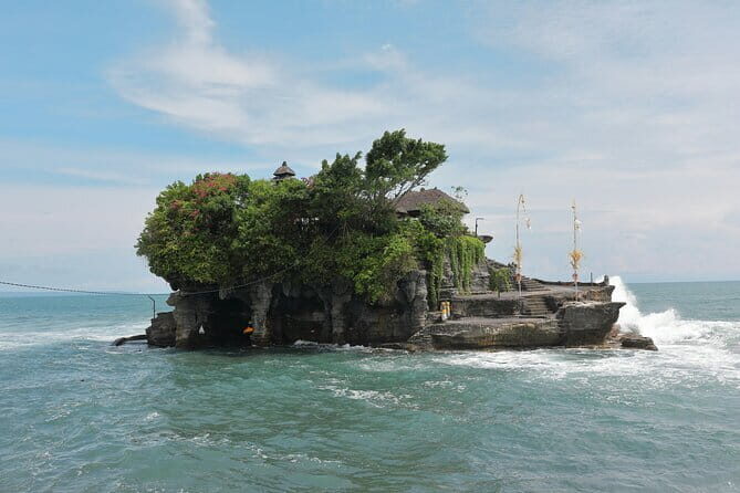 Full Day Ubud Tanah Lot Uluwatu All Inclusive Private Tour - Tegenungan Waterfall: a cool reset before the heat