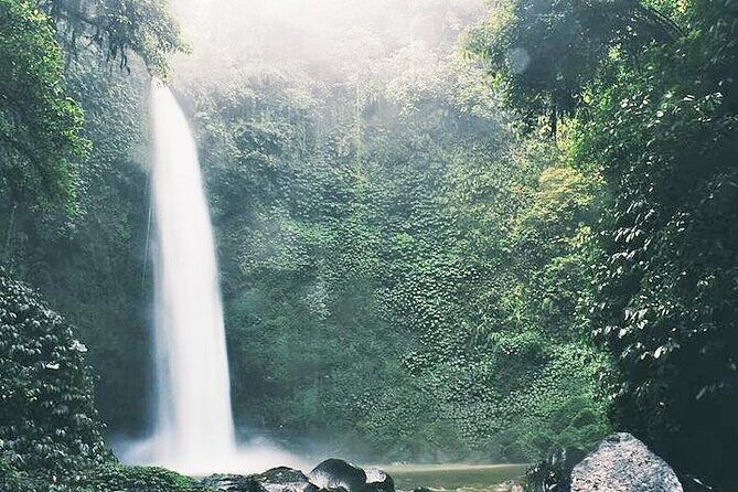 Hidden Nungnung Waterfall and Tanah Lot sunset Private Tour - Taman Ayun Temple: calm water gardens and thatched shrine strolls