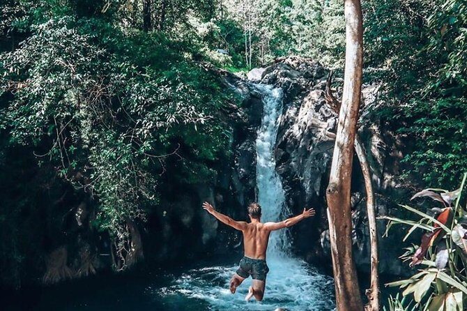 Jumping Sliding at Aling- aling Waterfall - Wanagiri Hidden Hill - Handara Gate - Aling-Aling and Kroya Waterfall: preparing for the 12-meter rush