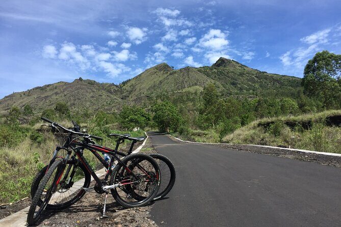 Private Bali Day Tour - Tegalalang - Kintamani and Temple Tour - Kanto Lampo waterfall: a fun finish, with weather-dependent footing
