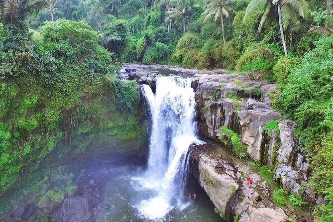 Private Ubud and Volcano Day Trip - Stop 1: Tegenungan Waterfall for swim-friendly photos