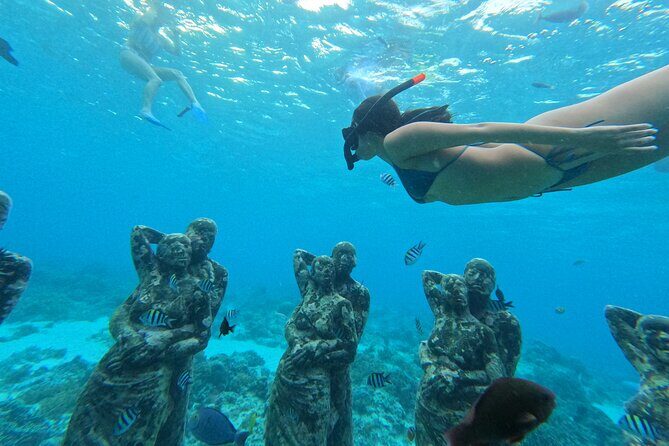 Public Snorkeling 3 Islands - Statue stop by glass-bottom boat: a strong first taste