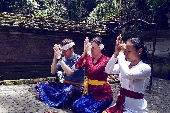 Soul Purification at Pura Mengening in Bali - Is it respectful to take photos and talk during the ceremony?