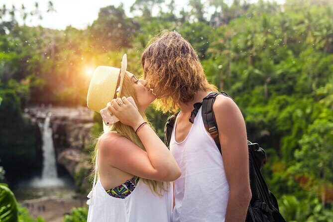 Ubud Private Tour: Monkey Forest - Tirta Empul Temple - Sacred Monkey Forest Sanctuary: temple carvings with a mischievous neighbor