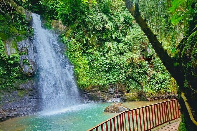 Ubud Top Waterfall and swing in tegallalang - Stop 3: Suwat Waterfall for the bamboo-raft and cave-like vibe
